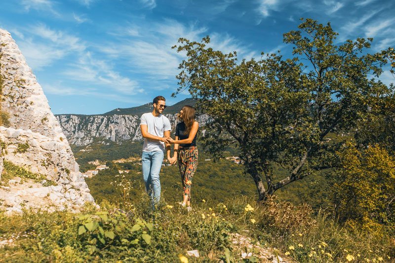 A couple walking the Love Path above Crikvenica
